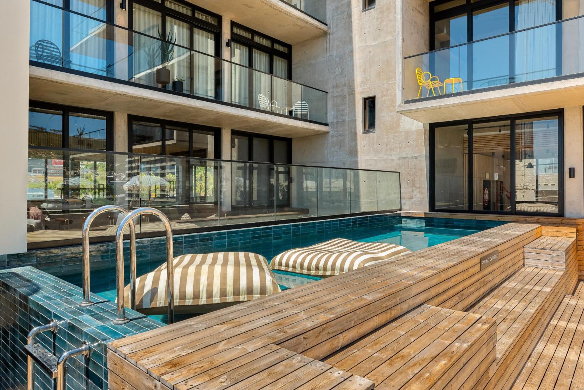 Neighbourgood 84 Harrington Aparthotel Kaapstad Buitenkant foto